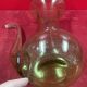 Design decanter, pourer in glassware of biot green vintage glass