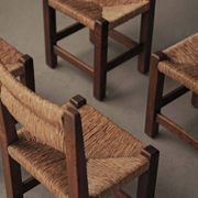 Set of four modernist chairs in oak and straw, France, circa 1960.