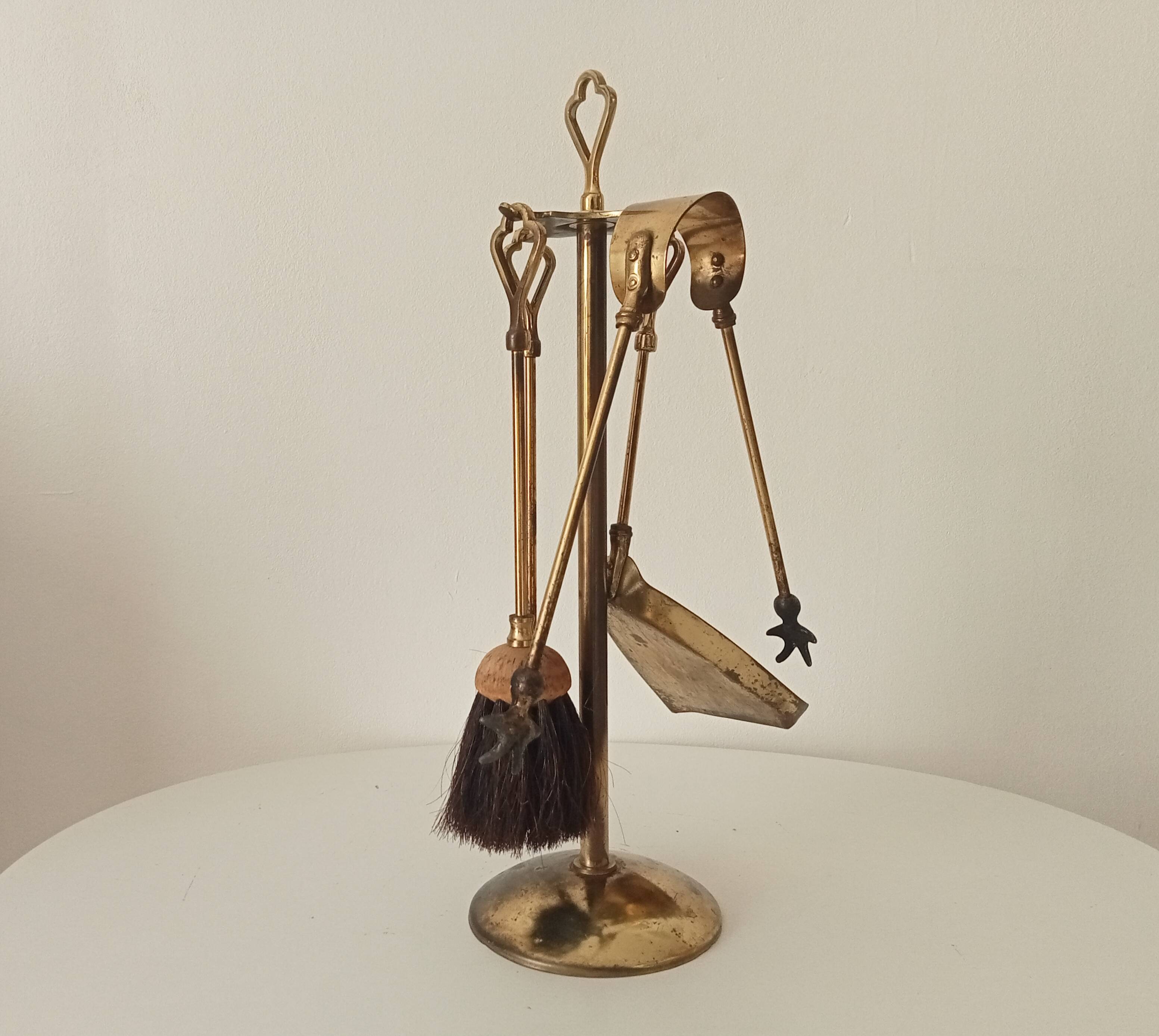 Old brass fireplace servant