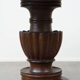 Wooden round 4-person dining table with detailed leg