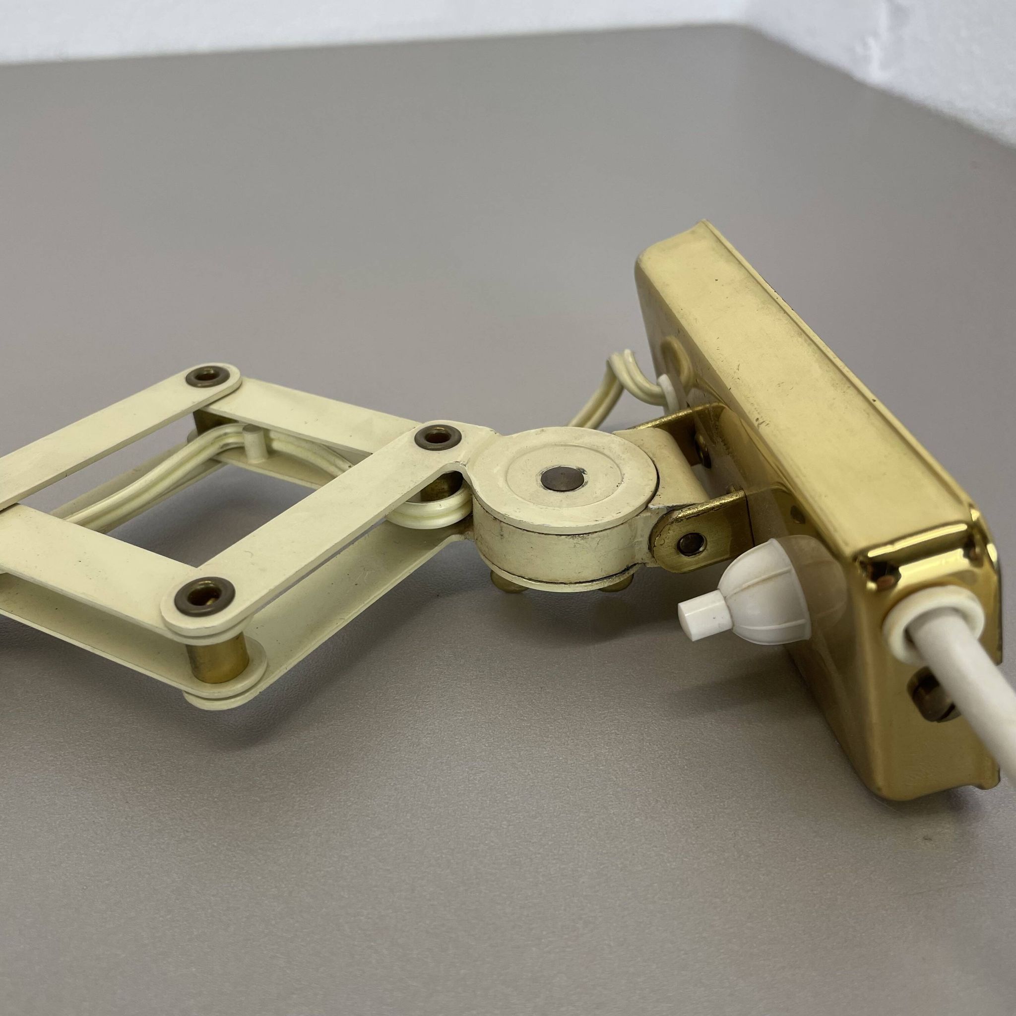 Original brass and metal scissors wall light by SIS Leuchten, Germany, 1950s.