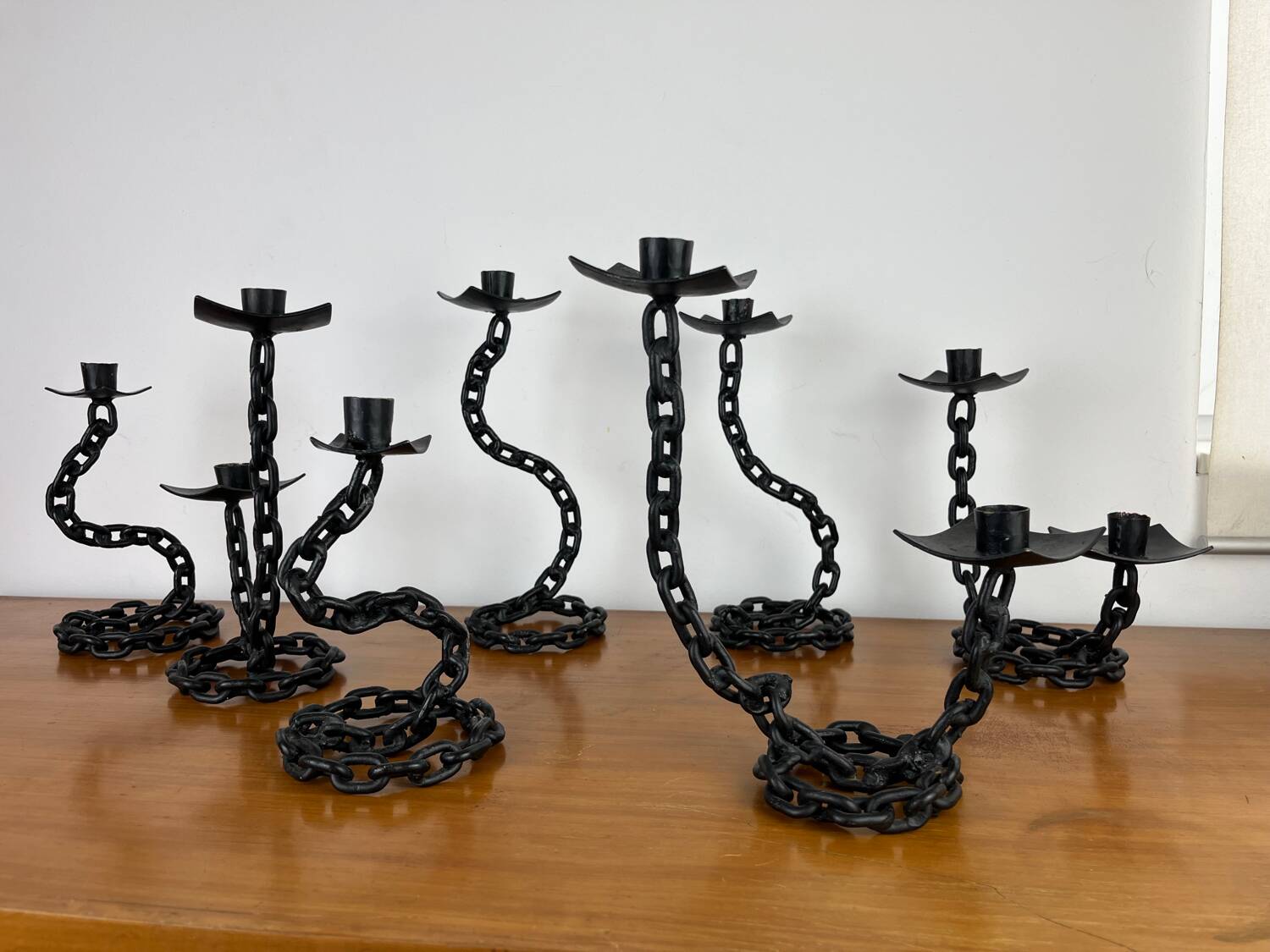 7 wrought iron candle holders in brutalist chain style