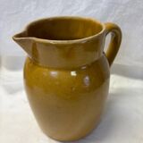 Old yellow sandstone pitcher