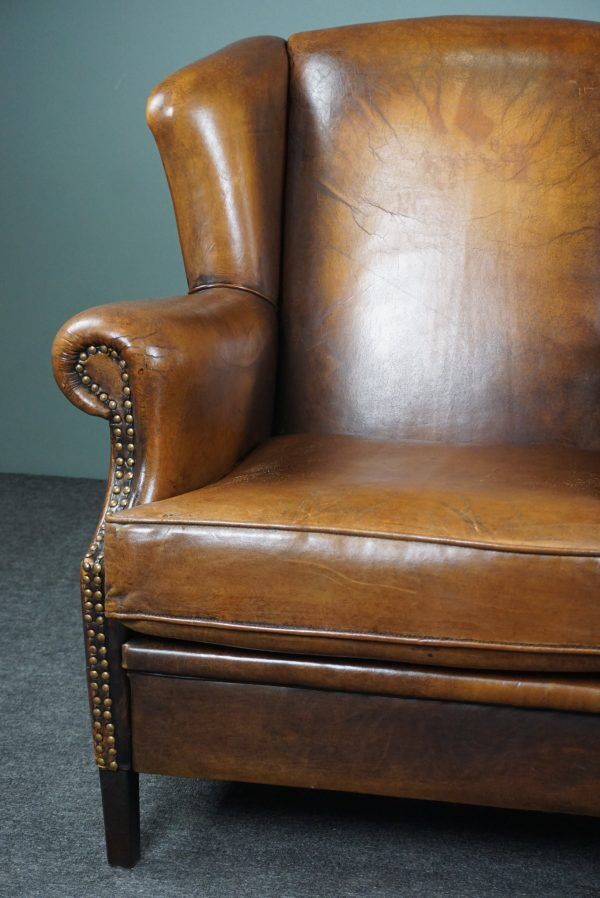 Armchair + sheepskin pouf