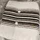 Boucle wool fireside chair and its 1970" vintage pouf