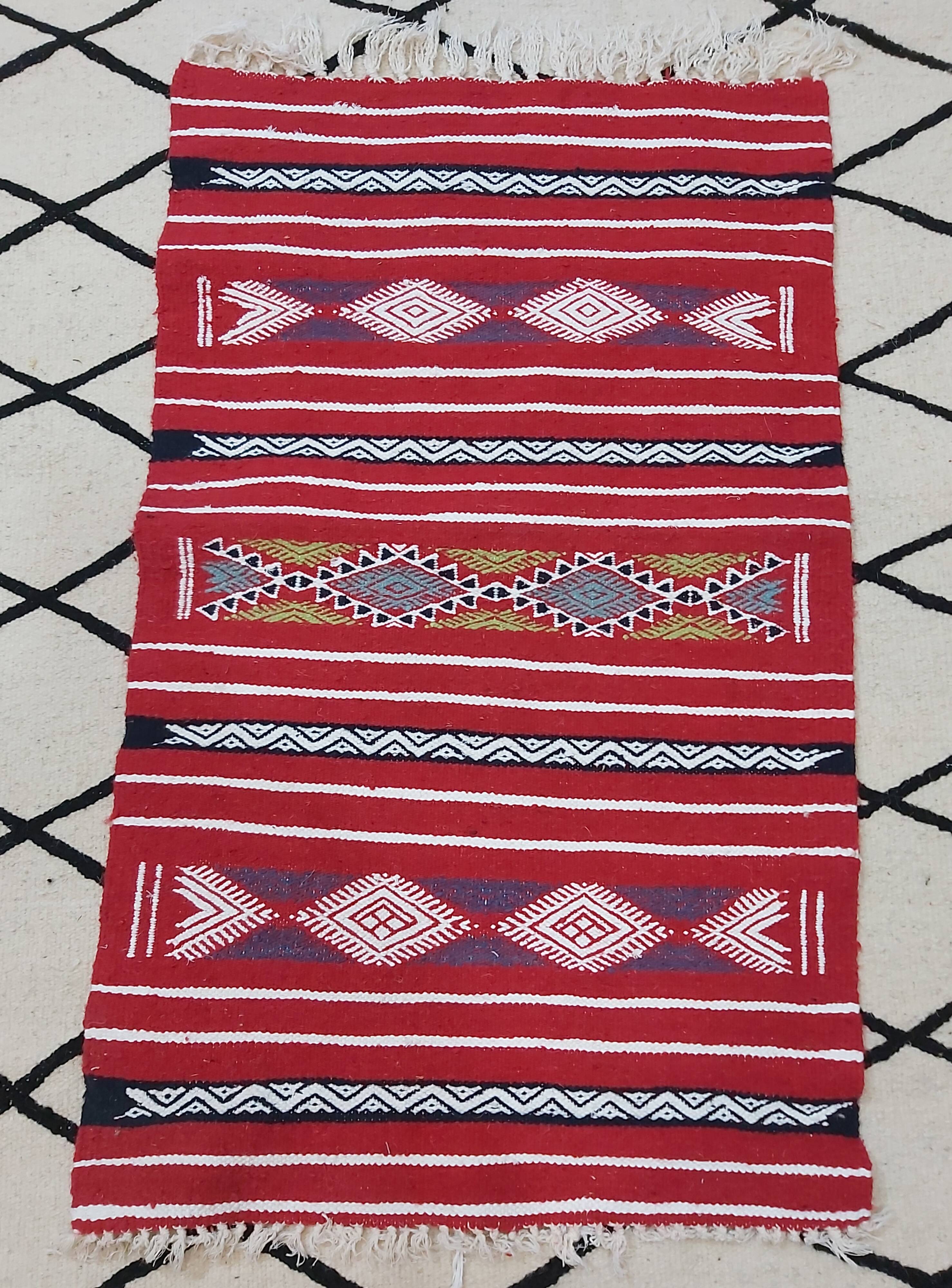 Traditional red kilim carpet