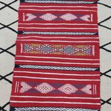 Traditional red kilim carpet