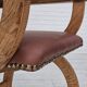 Années 1950, design danois, fauteuil retapissé, cuir marron naturel, bois de chêne.