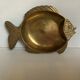 Empty brass fish bag