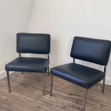 Black leather armchairs