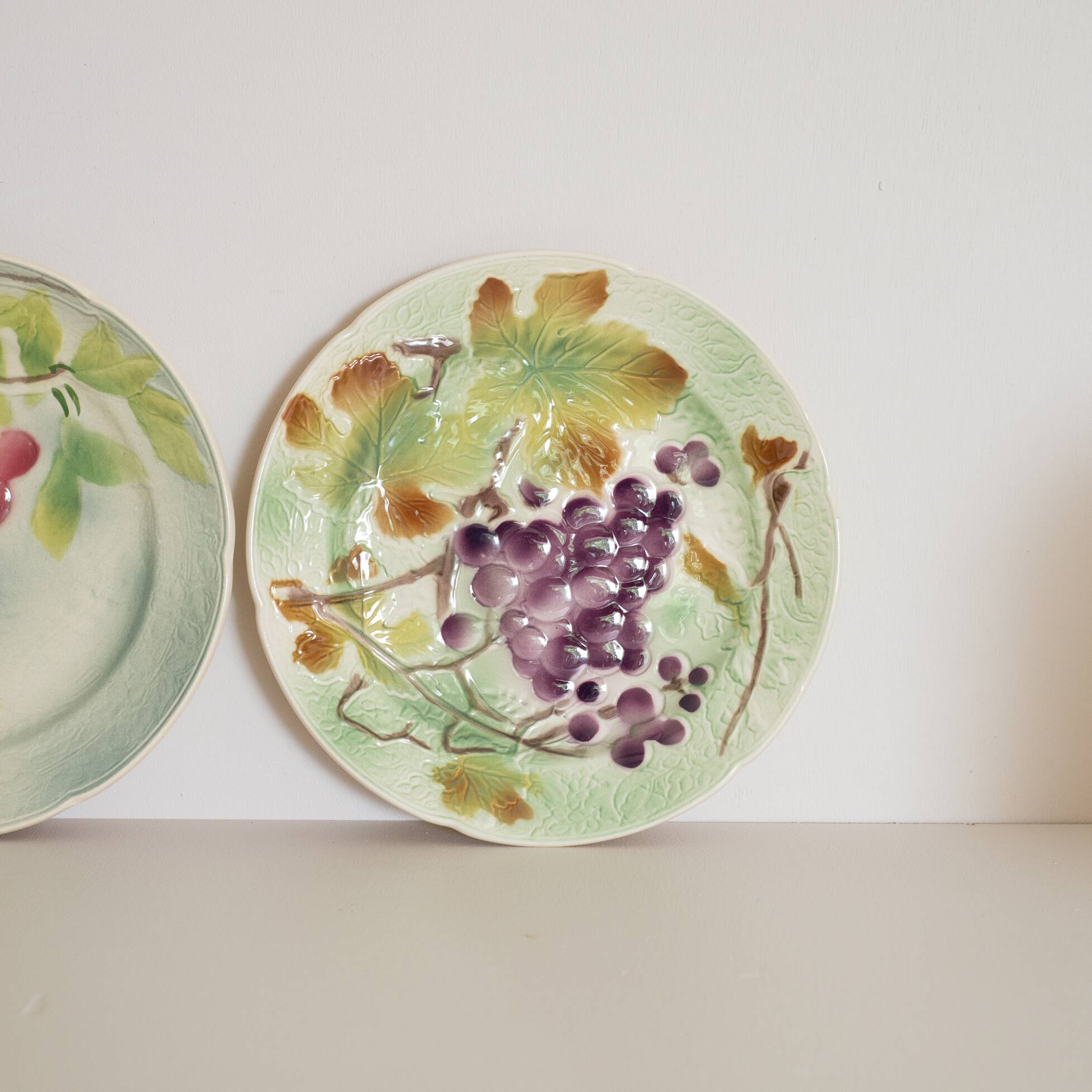 3 antique dessert plates decorated with fruit in slurry of Saint Clement