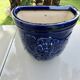 Wall pot in glazed blue terracotta with a grape motif, 1970s.