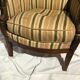 Fauteuil bergère aux dauphins époque Restauration