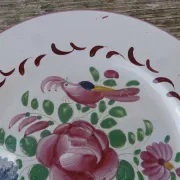Old St Clément earthenware plate, flat plate with flower patterns.