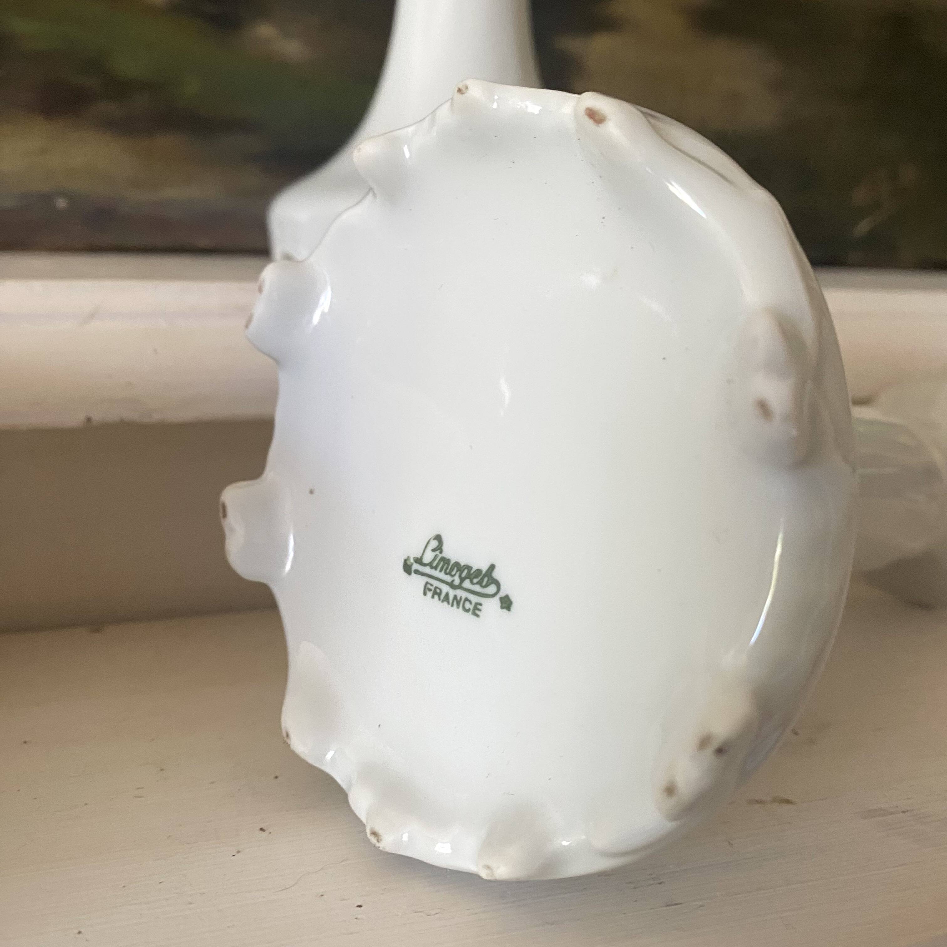 Pair of Limoges porcelain candlesticks