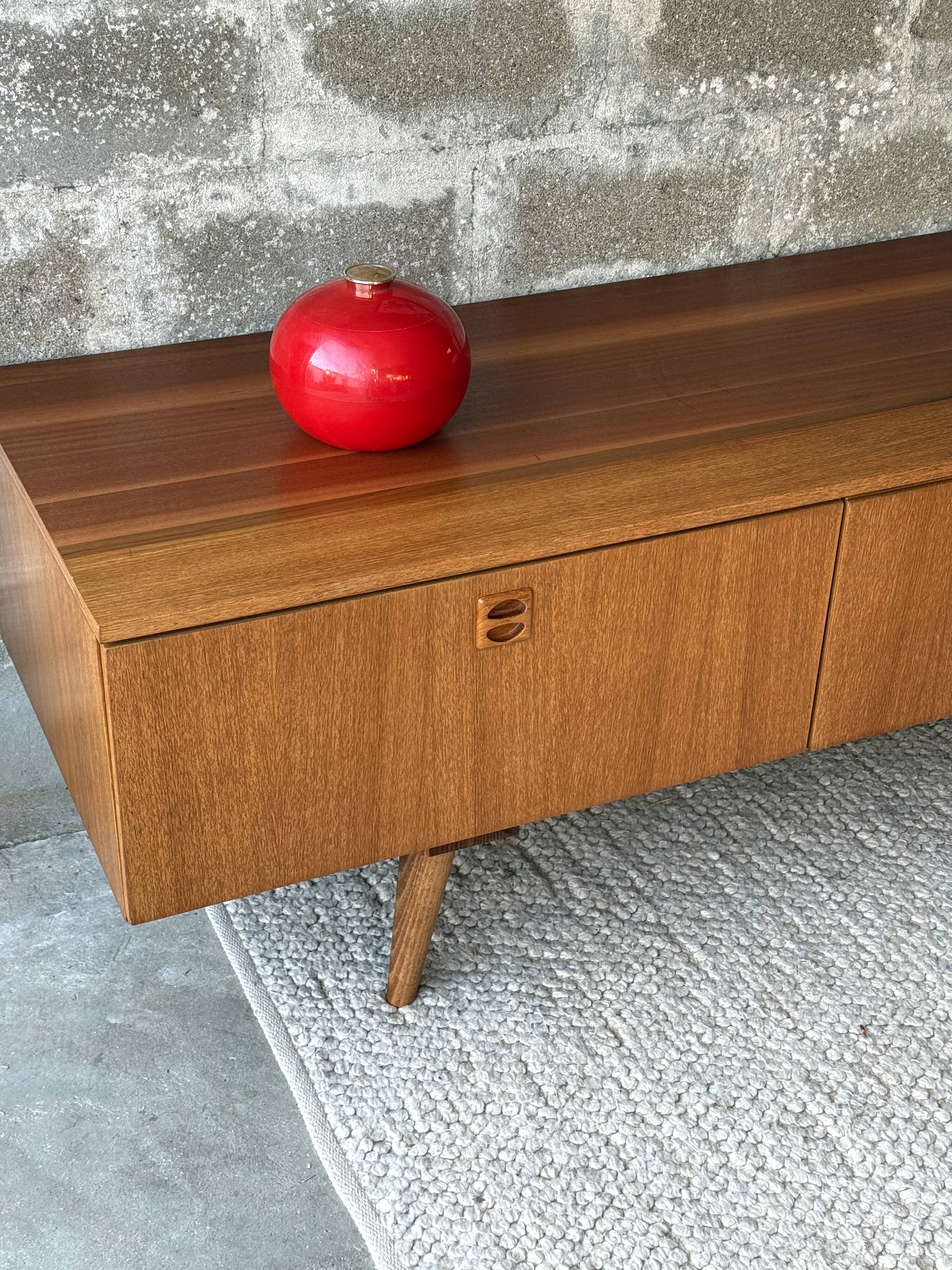 Scandinavian low sideboard in teak, 1970.