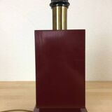 1980s vintage lamp base in red wood and gold metal.