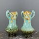 Pair of Art Nouveau vases in glazed ceramic with floral decoration, 20th Century