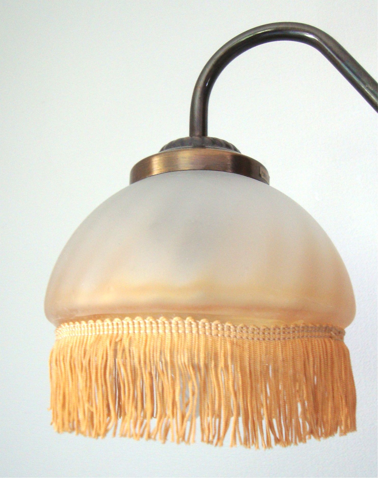Fringed sconce