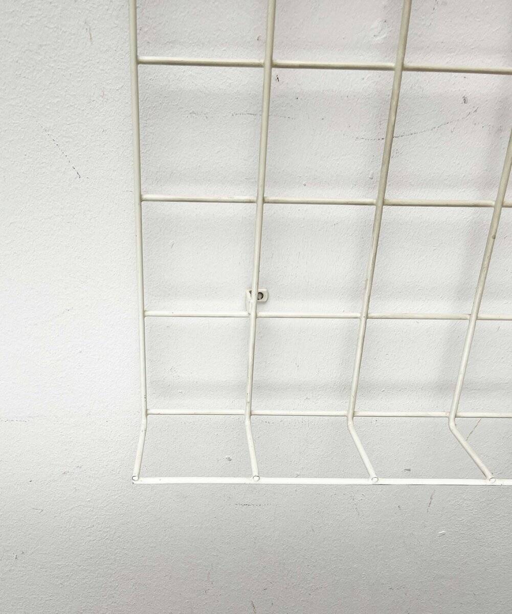 Minimalist white wire coat rack from mid-century Germany, 1960s.