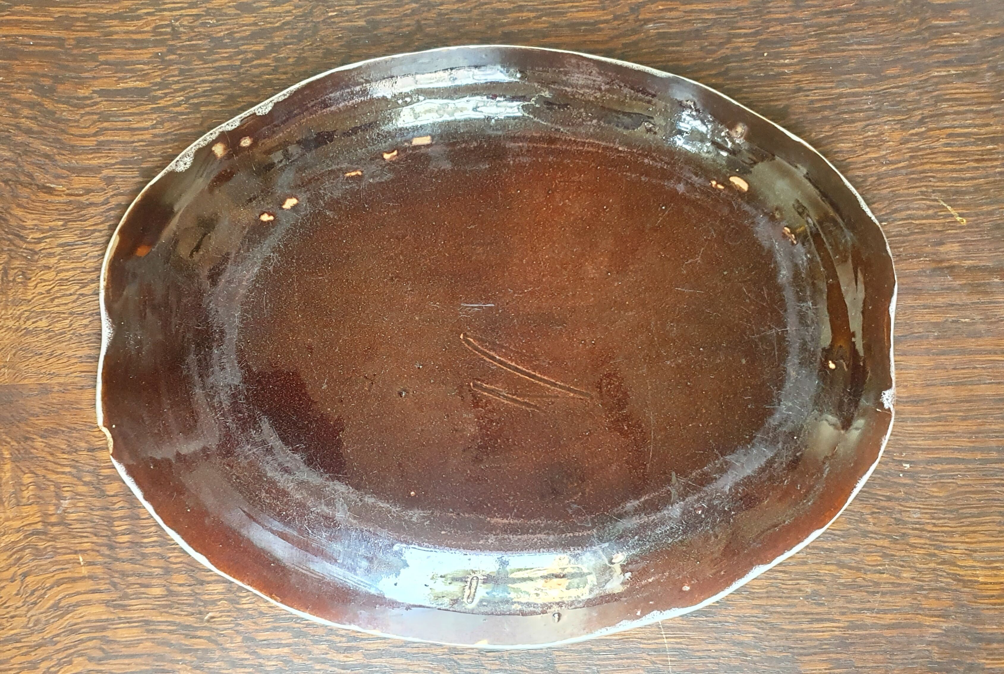 Faience dish "black ass"