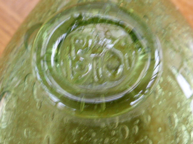 Biot stamped blown glass bottle