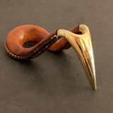 Carl Auböck pipe rack in leather and bronze, 1963