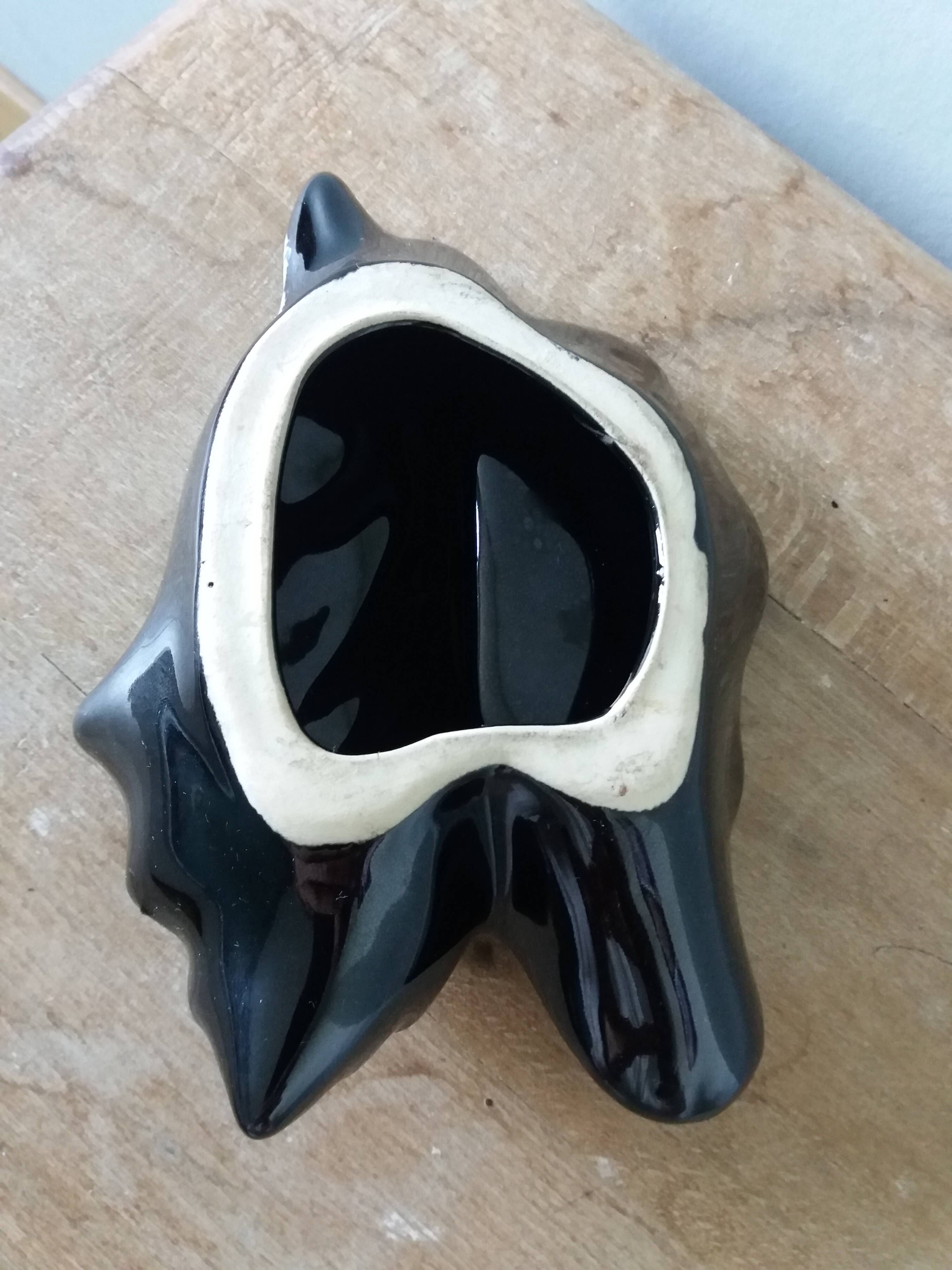 Black ceramic and foam shell ashtray