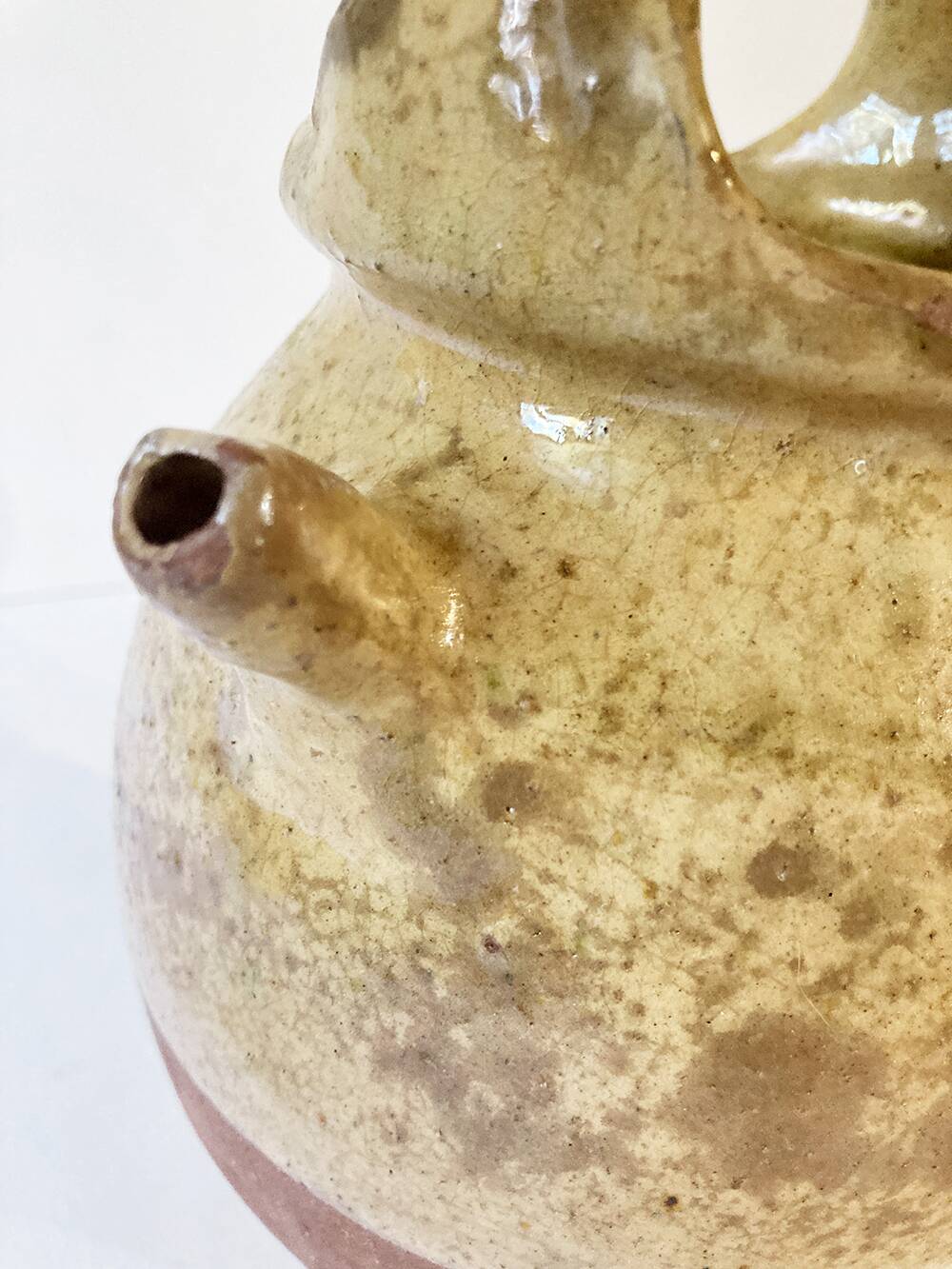 Antique Provençal jug / goat in yellow enamelled stoneware