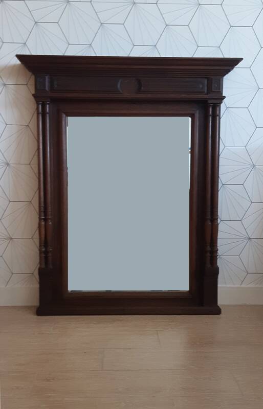 Henri II trumeau mirror for a fireplace in solid walnut.