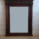 Henri II trumeau mirror for a fireplace in solid walnut.