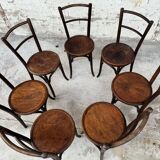 Série de 7 anciennes chaises bistrot Baumann bois courbé assise ronde