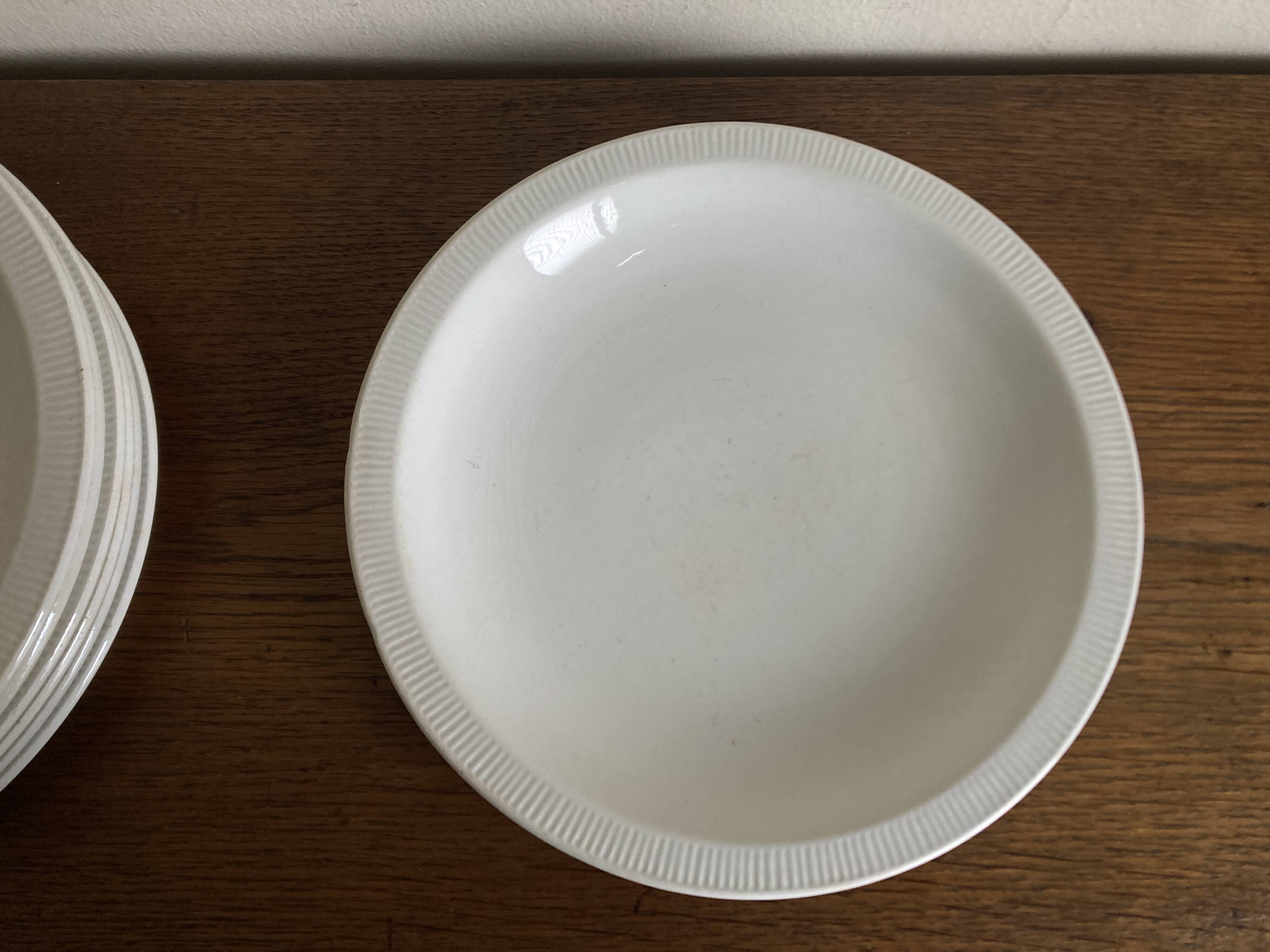 Set of 7 modernist flat plates Lunéville 1930 white earthenware
