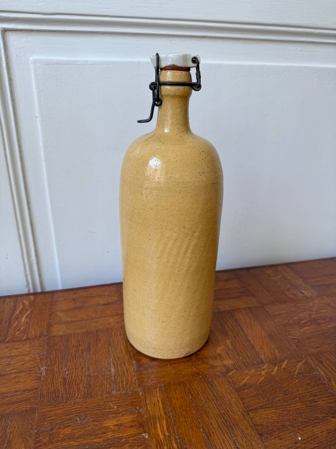 Vintage yellow stoneware bottle