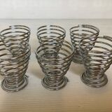Six metal spiral egg cups