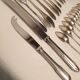 Set of mismatched silvered metal cutlery
