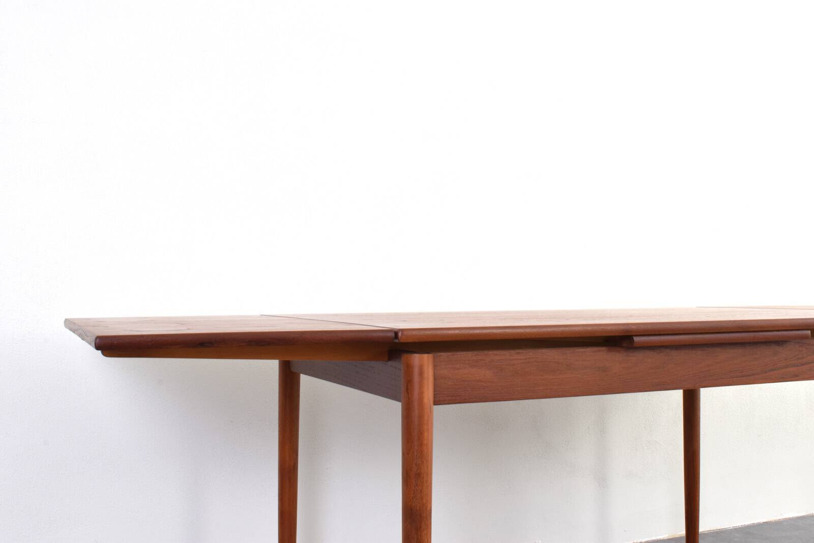 Mid-century Danish teak extendable dining table, 1960s.