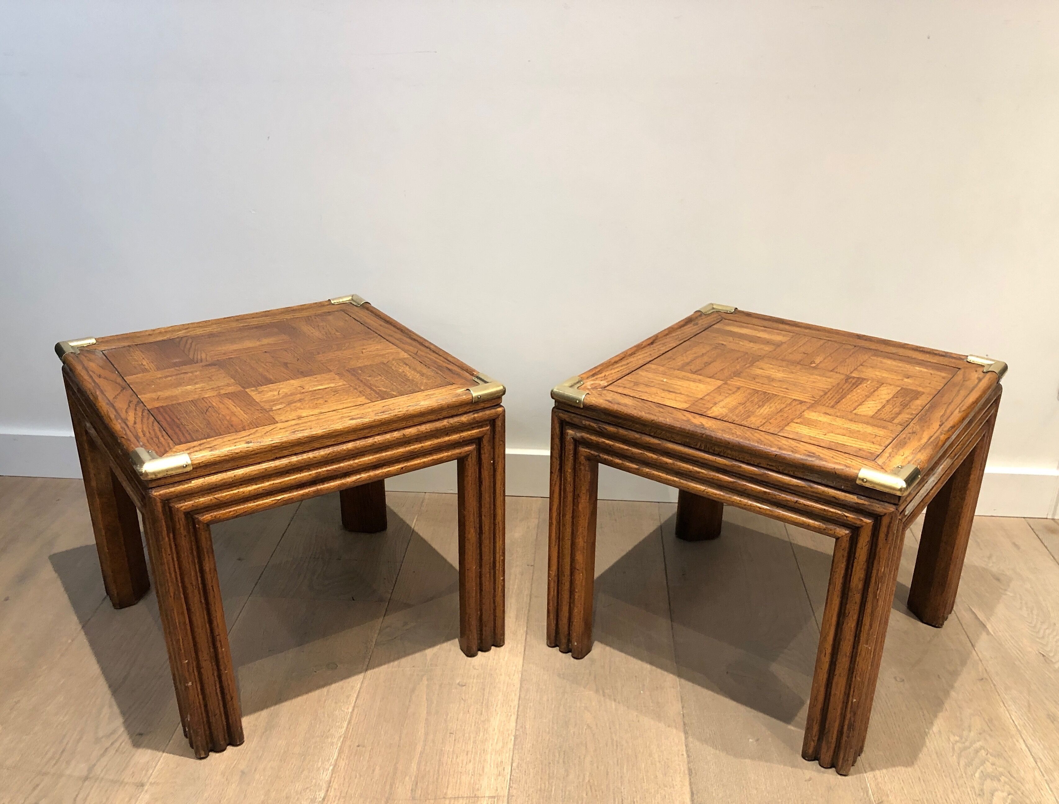 Pair of wooden and brass sofa ends