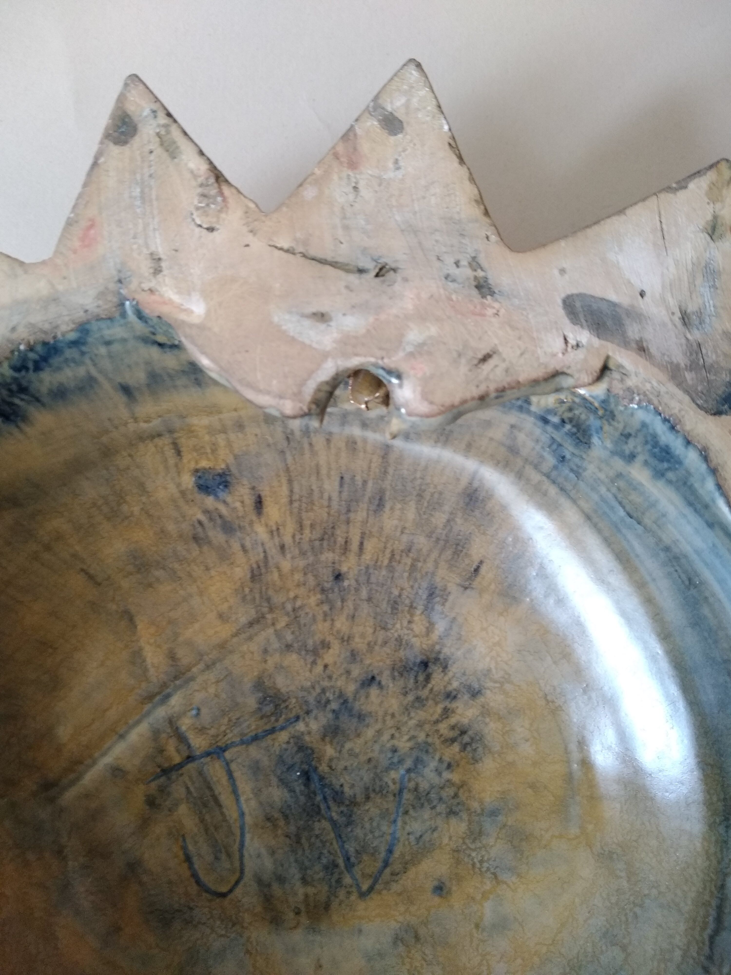 Vintage ceramic sun signed