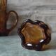Pitcher and its glasses in amber glass