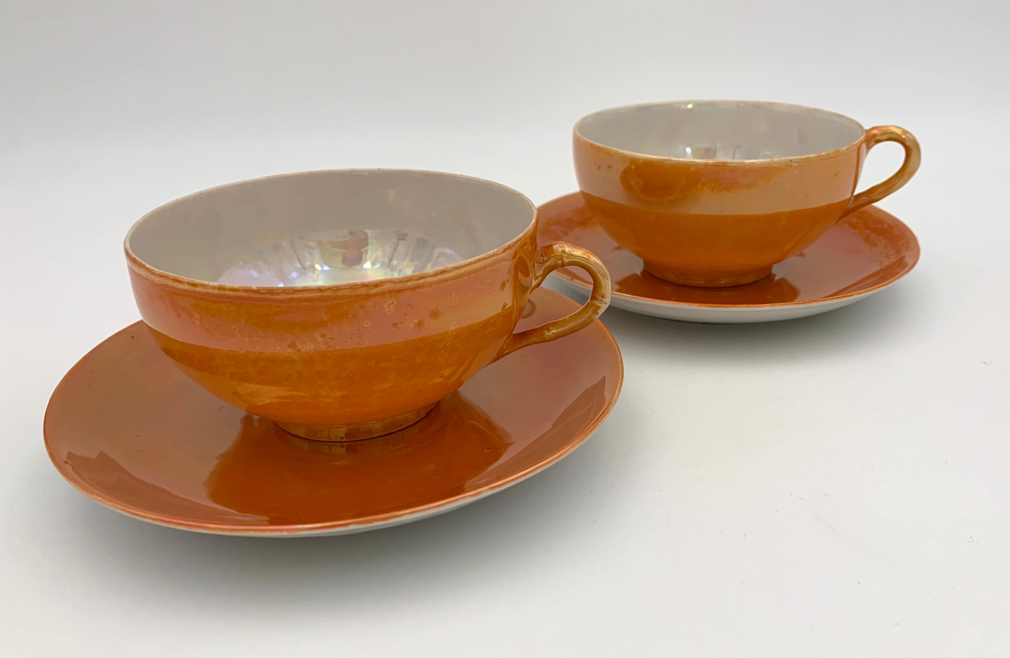 Two old tea cups in fine porcelain with iridescent cover, China, signed - XXth