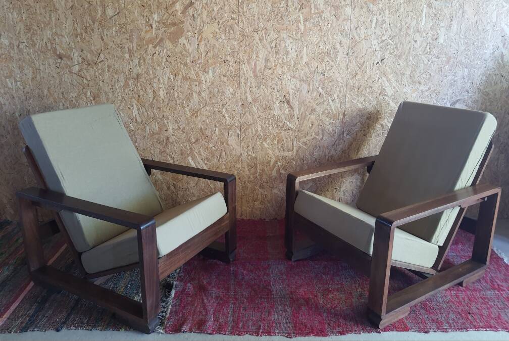 Pair of modernist Rio rosewood rack-and-pinion armchairs