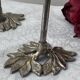 Pair of metal flower candlesticks