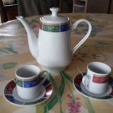 Coffee service cups saucers and coffee maker