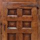 Armoire rustique en bois avec porte à panneau sculpté et ferrures en fer - Espagne, début XIXe siècle