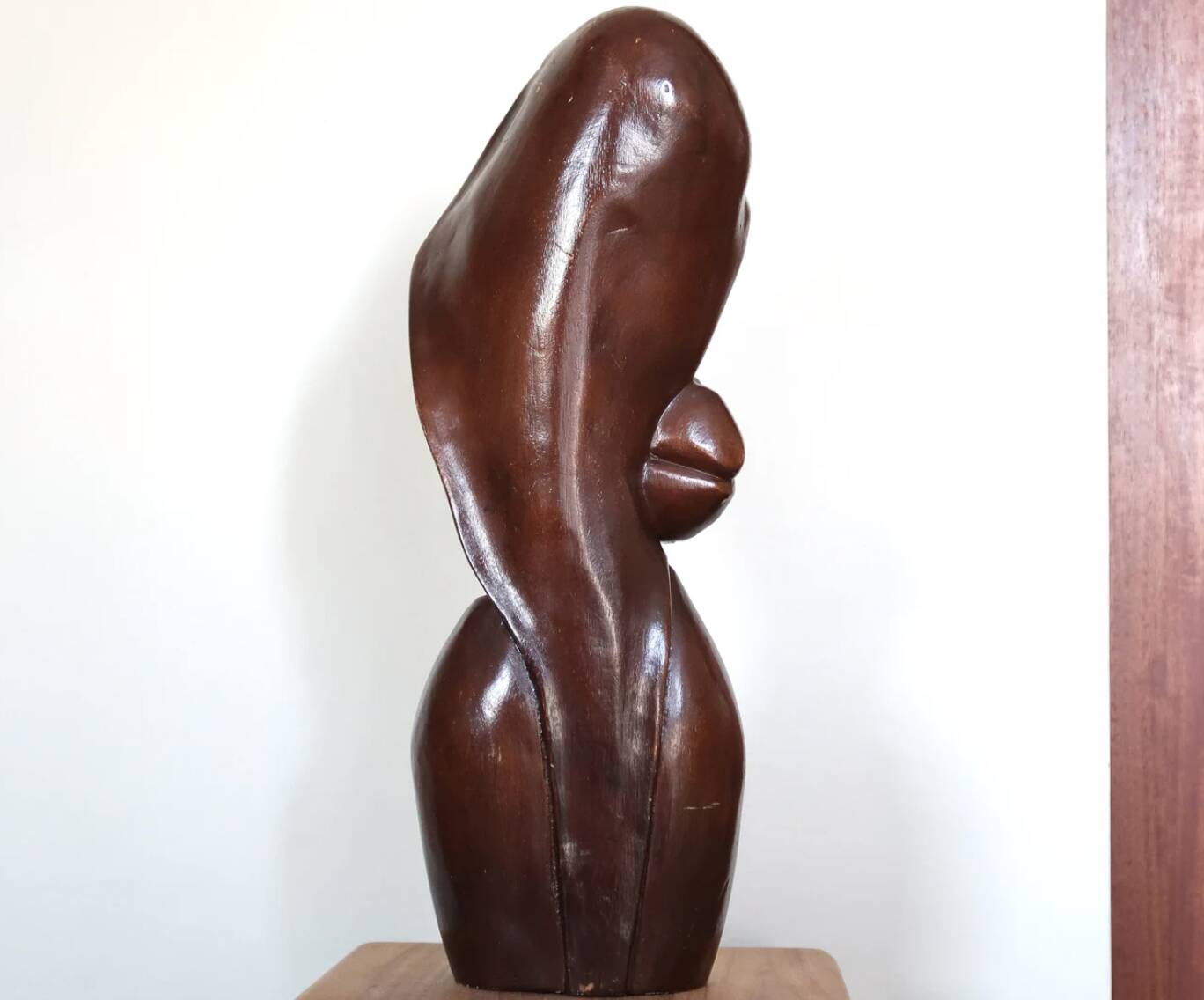Wooden sculpture of a woman with a flower, 1970s