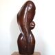 Wooden sculpture of a woman with a flower, 1970s