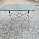 Old folding iron garden table