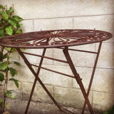Ancient wrought iron pedestal table