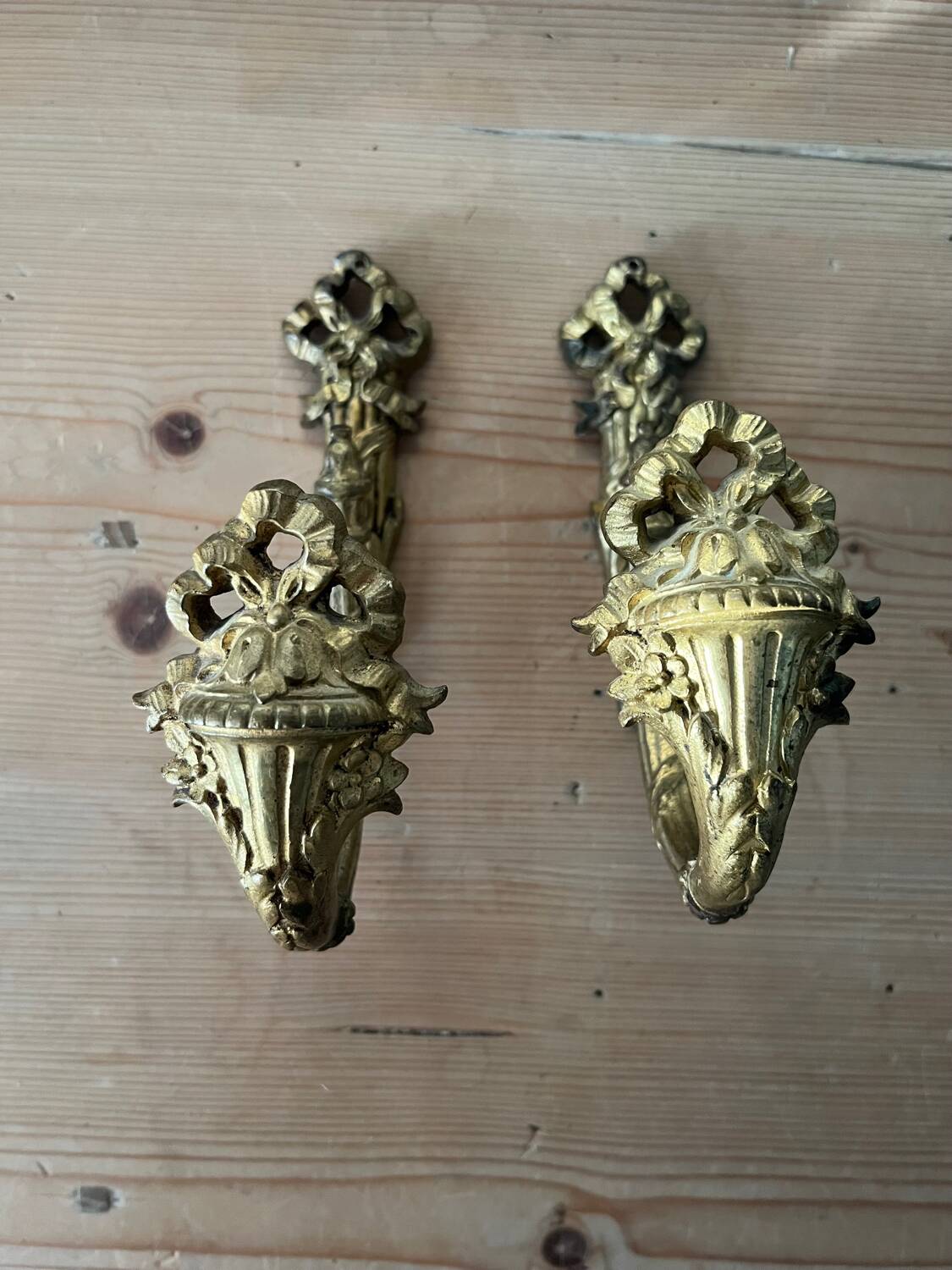 Pair of bronze curtain tiebacks